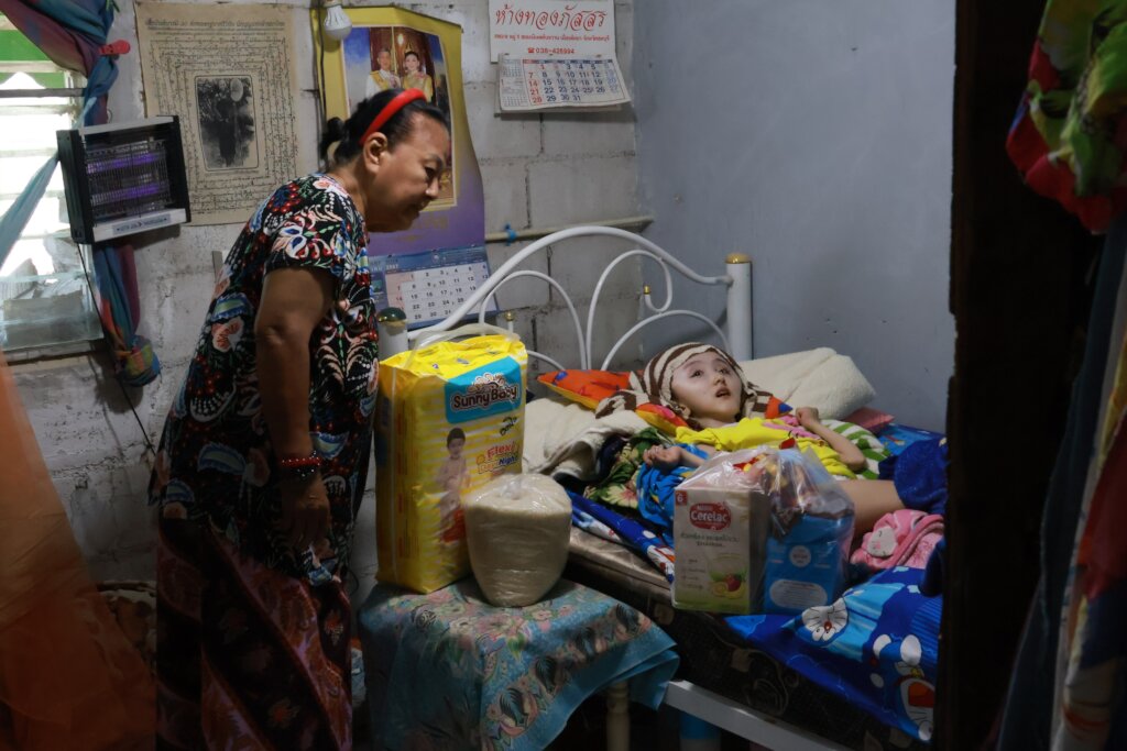 Loving grandma caring for her granddaughter