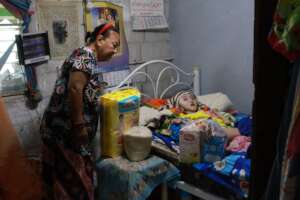 Loving grandma caring for her granddaughter