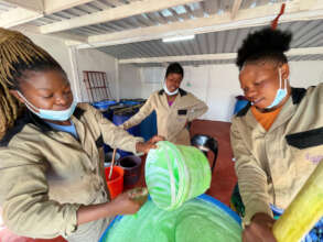 Rosemary, Trish and Lynes mix soap in Harare