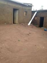 Brick structure holds the water tank next to house