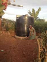 Mom at her water tank