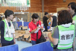 Distributing supplies while hearing the needs at s