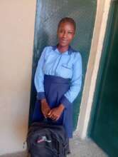 A picture of Deborah at school