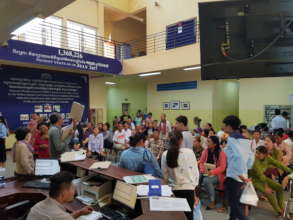 The waiting room buzzing with patients and staff