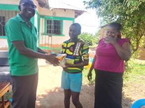 Outpost families receiving gifts