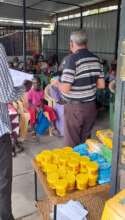 Elderly women of the community receiving gifts