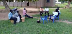 Field staff meeting with parents