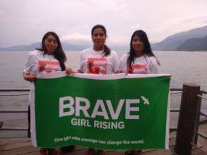 Mentors with the new Brave Girl Rising flag.