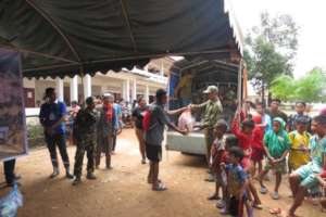 Food packages and hygiene kits are distributed