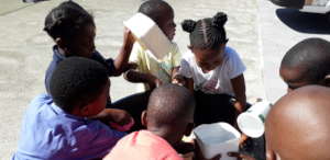 Engaged children having fun with water