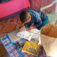Excited child with home pack