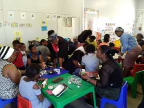 Parents having fun at Starting Chance workshop