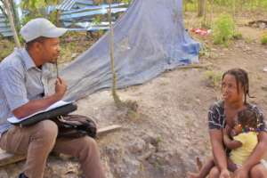 A casework and a participant during a weekly mtg.