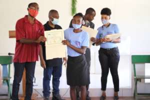 A graduate receiving her diploma last October.