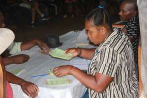 Leaders of a community savings and loan meeting.