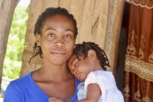 A Family Graduation Pgm participant and her child.