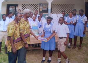 Ghana students receiving the new school books
