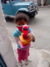 A Girl after picking up lunch from her school