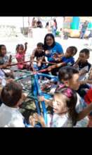 Principal Monica with Children at her School