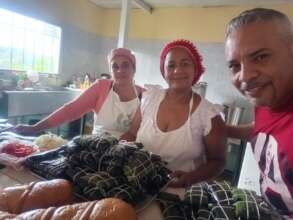 Cooks and Project Leader with Christmas meal