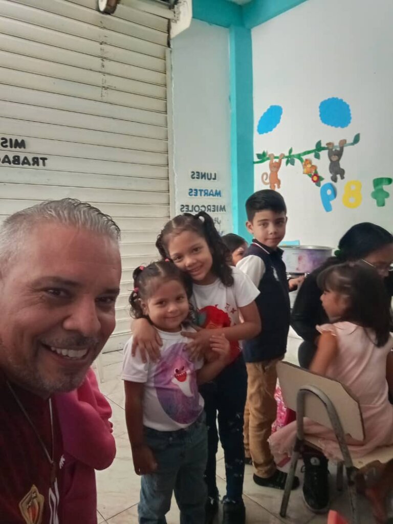 Jose with some of the children