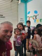 Jose with some of the children