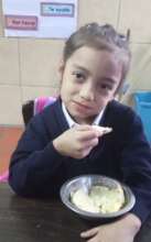 Deylimar having breakfast at her school