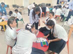 FOREFRONT School students engage in a robot buildi