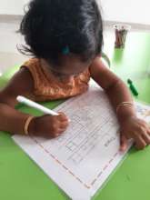 FOREFRONT student learning the English alphabet