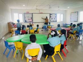 Teacher providing instruction in a FOREFRONT class