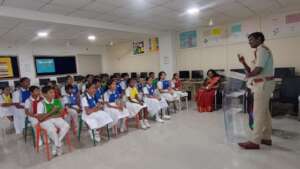 Guest speaker giving a talk to 7th grade class