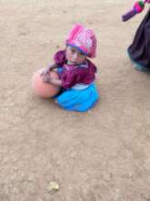 Girl playing while waiting for her turn