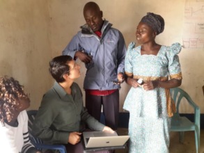 Viewing building plans. Photo by Eldoma Dawood