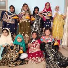 Children Receive Eid Clothes Along With Biryani