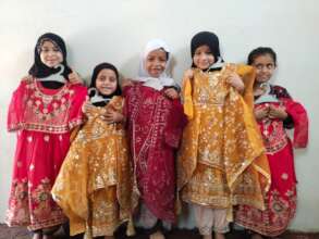 Children Receive New Clothes for Eid