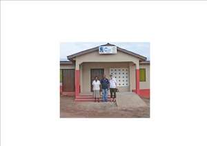 Midwife,project team in front of Health Centre