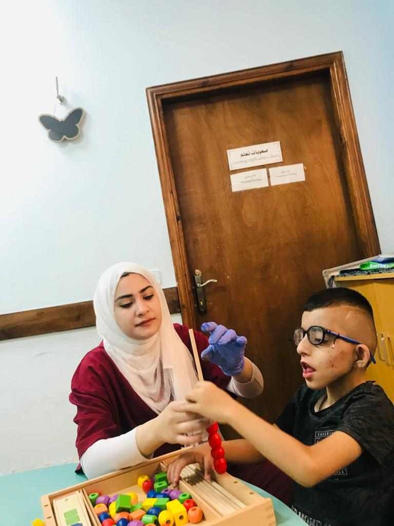 Drawing a smile for disabled children in Bethlehem