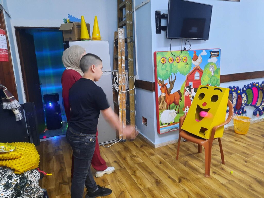 Drawing a smile for disabled children in Bethlehem