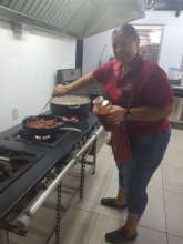 Our cook cooking