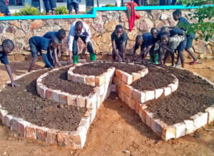 Students creating a tiered garden.