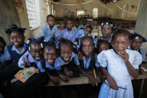 Schoolkids in Haiti (Photo Credit: Jon Brack)