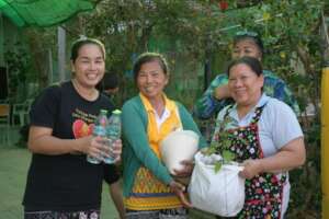 Families come to the centre to get their plant