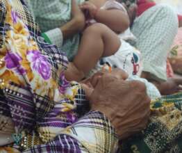 A mother, her baby, and the support of a grandma.