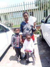 Emma and her children outside Dpt of Home Affairs