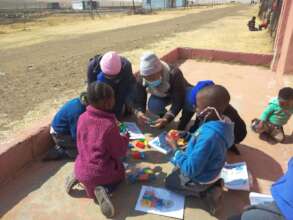 Children playing with Dulpo sets