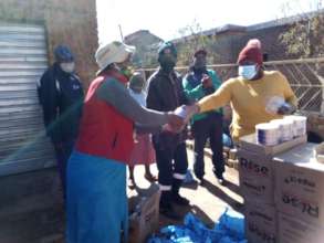 Mamokete receiving food parcel