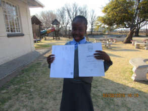 Proudly showing off her certificate