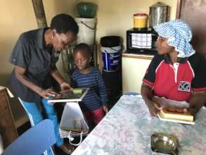 Working in the community with caregivers.