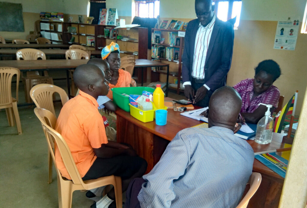 Librarian Lucy recording pupils at school library