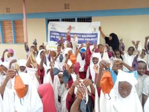 Pupils display their masks